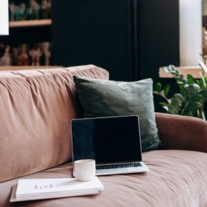 a laptop on a couch